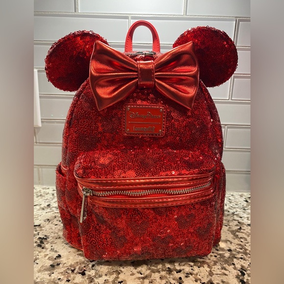cinderella exclusive holiday castle light up mini backpack DROP: Loungefly Disney Night Scene Glow and enamel zipper charm details Disney Parks Loungefly Mini Backpack